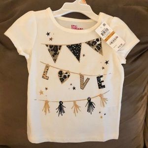 Short sleeve white, black and gold toddler shirt. The brand is Epic Threads.